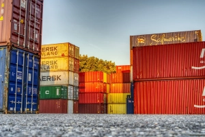 A stack of shipping containers stacked in our yard